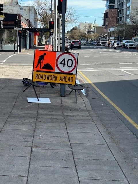 Roadwork ahead signage setup